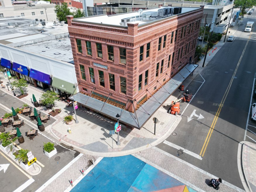 Overhead view of restored Telephone Building with new awning.