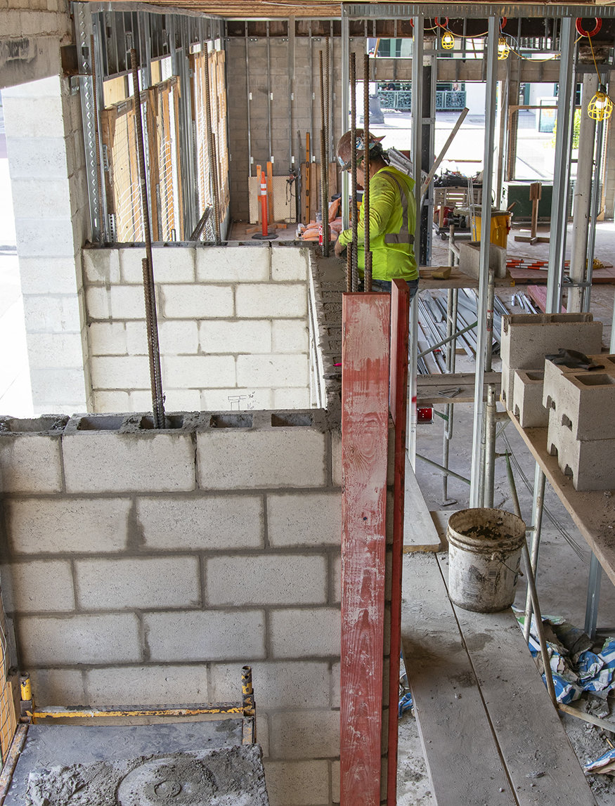 New entry is framed in masonry.