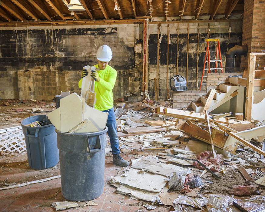 Waste bins filled during 635 Cleveland interior cleanup