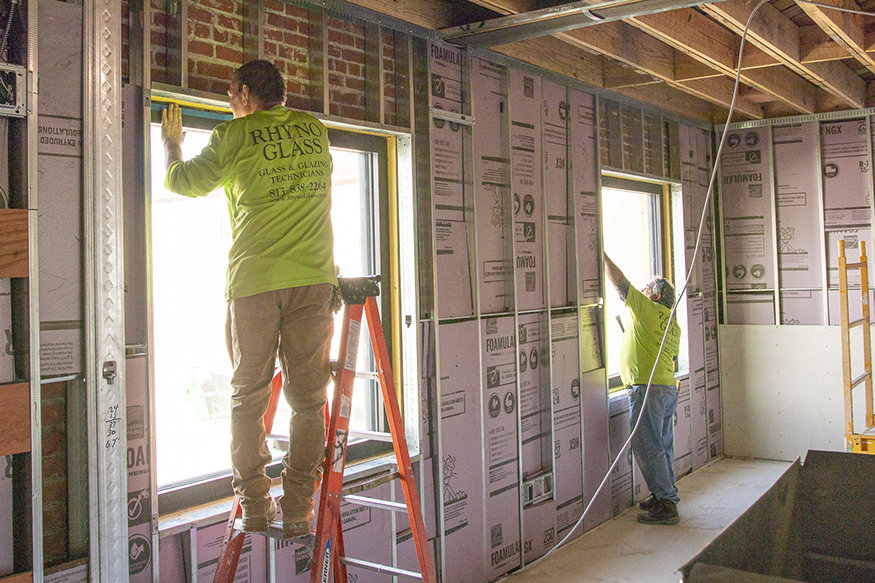 Adjusting glass for proper fit.