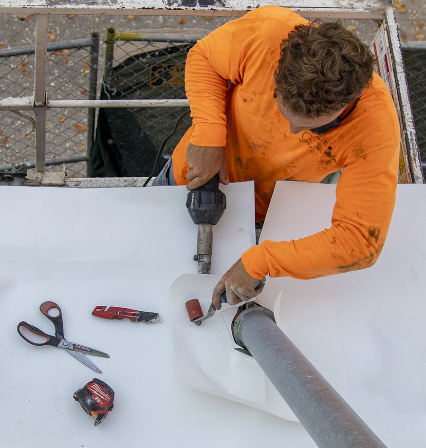 Heat tools used to install awning roof.