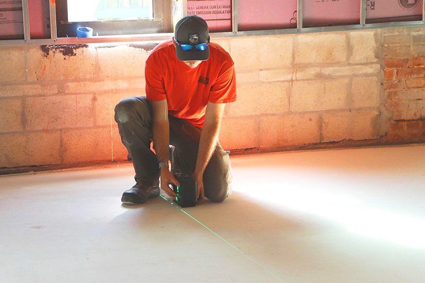 Aligning ceiling light fixtures.